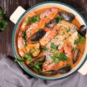 Bouillabaisse is a traditional Provençal fish stew that embodies the flavors and aromas of the Mediterranean Sea.