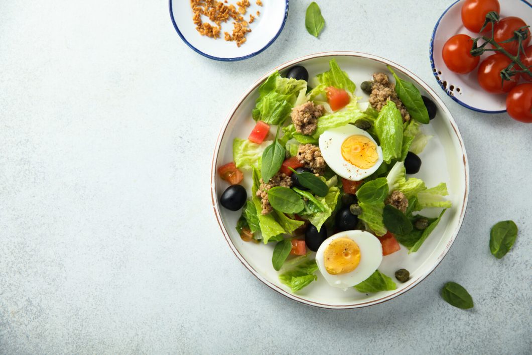 Salade Niçoise is a vibrant and nutritious dish from the French Riviera. The traditional version often includes anchovies, but this variation omits them, catering to those who prefer their salad without.