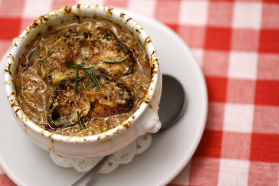 Soupe à l'Oignon, or French Onion Soup, is a classic French dish that's rich, savory, and immensely comforting, particularly on a cold day.