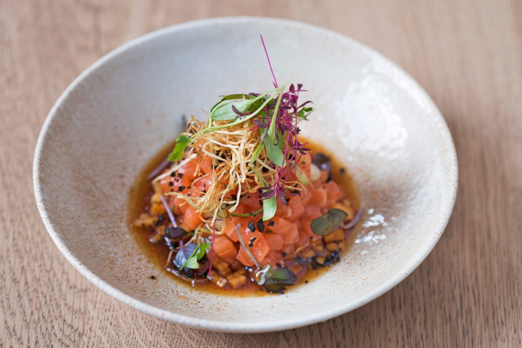 Tartare de Saumon (Salmon Tartare) is a sophisticated and refreshing appetizer, perfect for a gourmet dining experience.