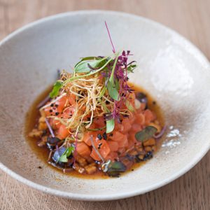 Tartare de Saumon (Salmon Tartare) is a sophisticated and refreshing appetizer, perfect for a gourmet dining experience.