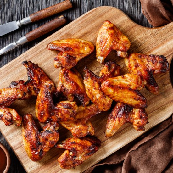 Buffalo Chicken Wings are a classic American appetizer, known for their spicy, tangy sauce and often served with celery sticks and blue cheese or ranch dressing. Originating from Buffalo, New York, these wings are perfect for gatherings, especially sports events.