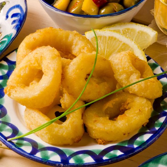 Calamares a la Romana is a tasty, crowd-pleasing dish often enjoyed as an appetizer or a snack, particularly popular in coastal regions of Spain.