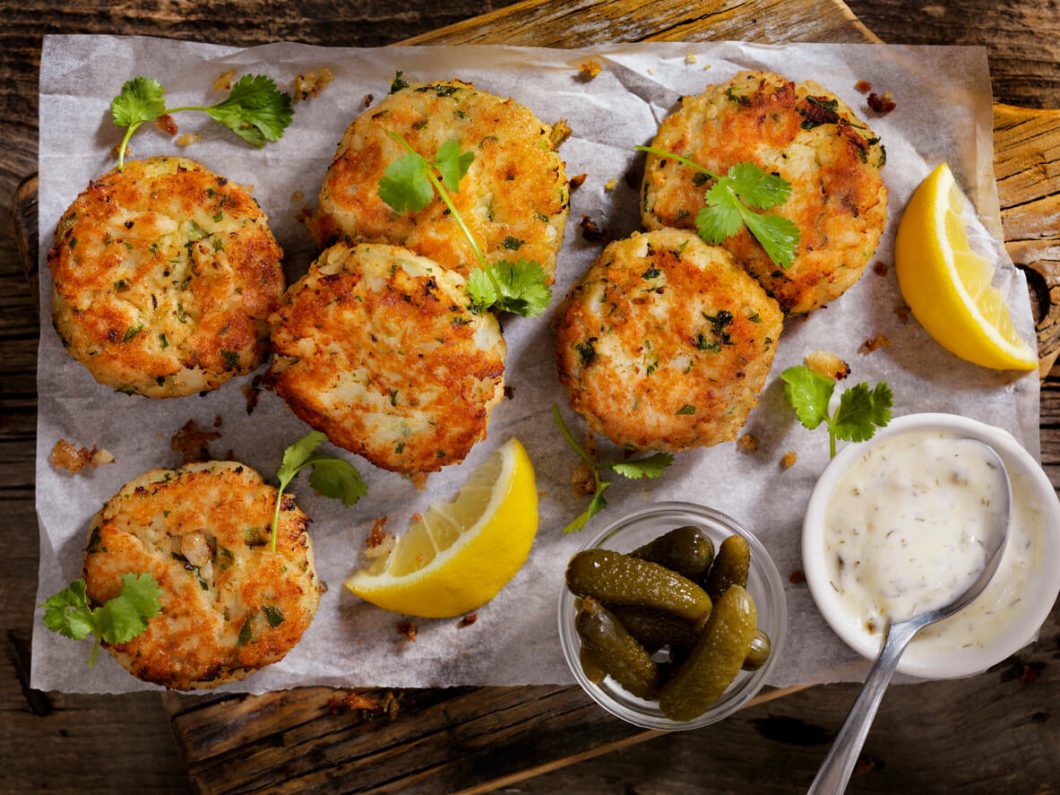 Crab Cakes are a popular seafood dish known for their crispy exterior and tender, flavorful interior, packed with crab meat and various seasonings.