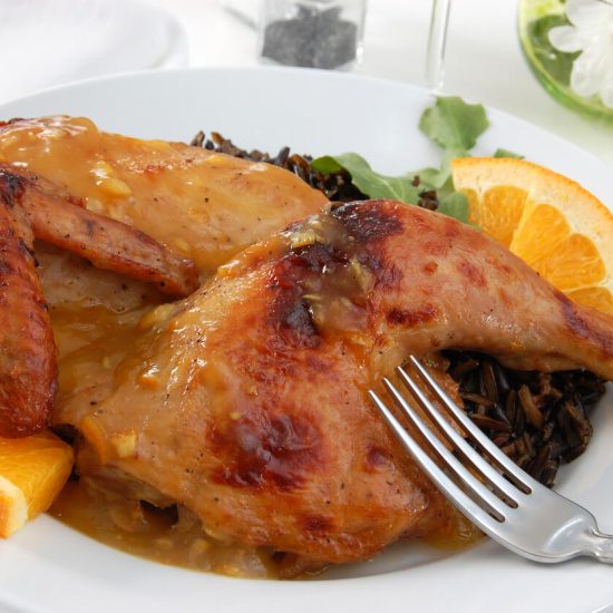 Duck à l'Orange is a classic French dish that combines the rich flavor of duck with a sweet and tangy orange sauce.