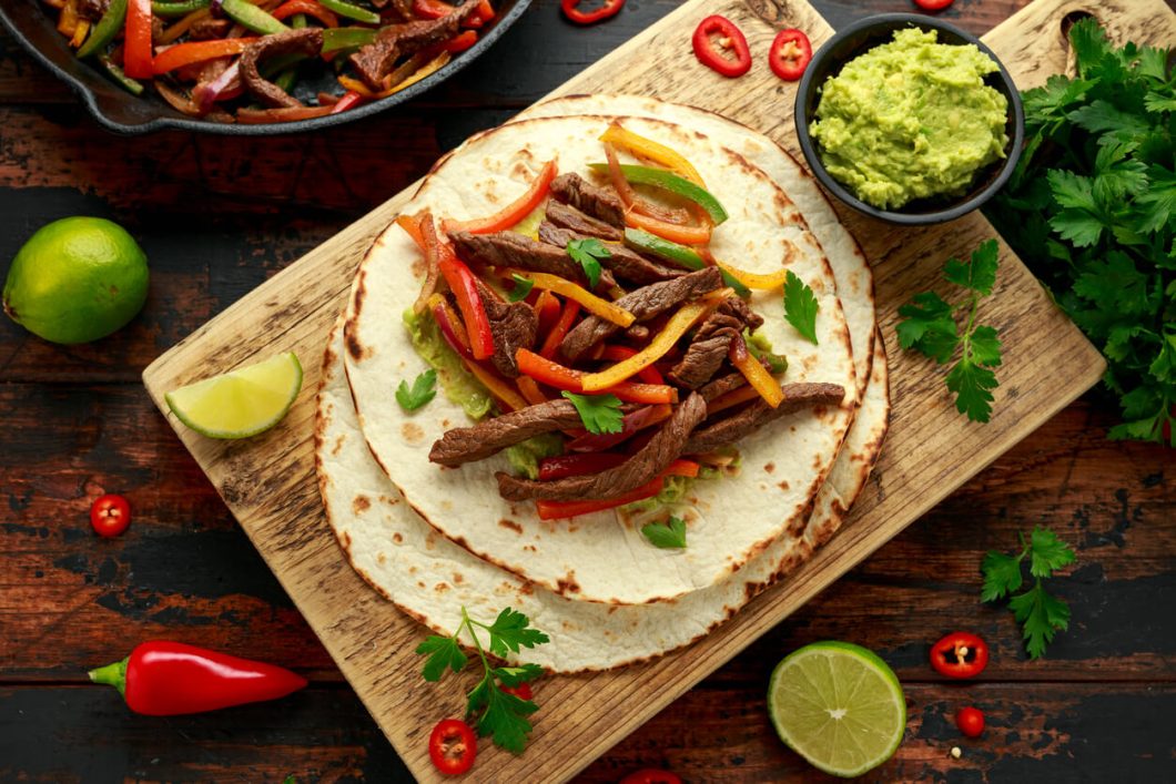 Fajitas are not only delicious but also a fun and interactive meal, perfect for gatherings where guests can enjoy customizing their own plates.