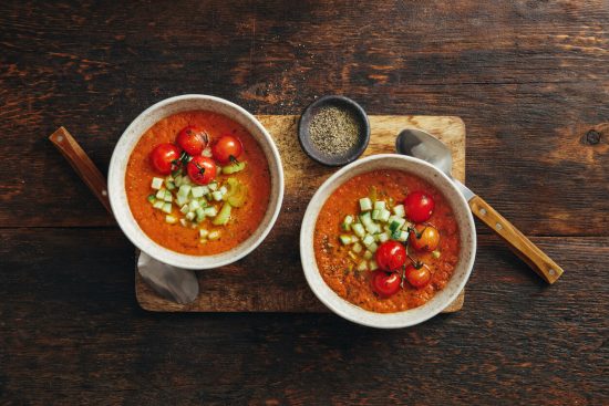 This Gazpacho with a glass of Albariño offers a refreshing and nutritious meal, perfect for hot summer days, delivering a blend of vitamins, minerals, and antioxidants from the array of fresh vegetables used in the recipe.