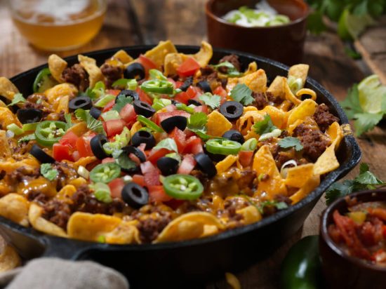 achos are customizable to suit any palate and are perfect for sharing, making them a favorite for game nights, parties, or a casual dinner.