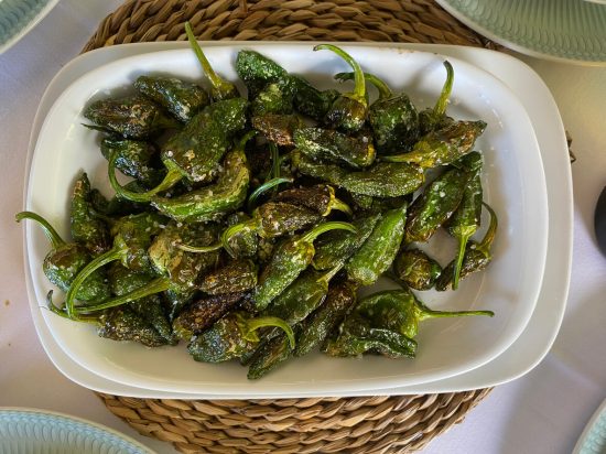 Pimientos de Padrón offer a delightful blend of flavors and textures, with the potential for a surprise spicy pepper in the mix. They're a perfect example of the simplicity and elegance of Spanish tapas.