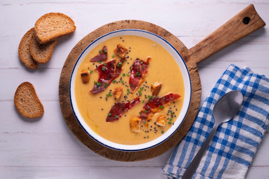 Salmorejo is a delightfully refreshing dish for warm weather, offering a velvety texture and rich flavor profile that serves as a testament to the simplicity and elegance of Spanish cuisine.