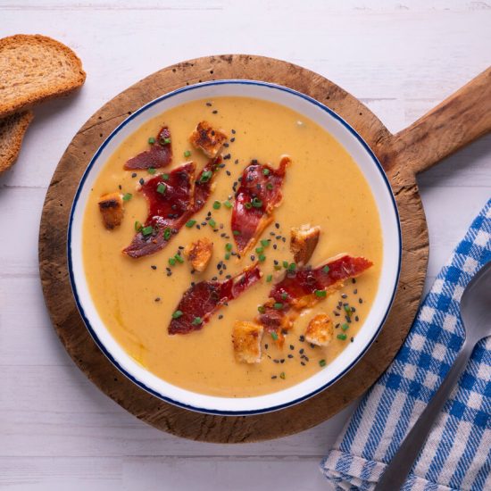 Salmorejo is a delightfully refreshing dish for warm weather, offering a velvety texture and rich flavor profile that serves as a testament to the simplicity and elegance of Spanish cuisine.