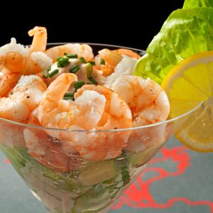 Shrimp Cocktail is a classic appetizer that combines chilled, cooked shrimp with a tangy, spicy cocktail sauce.