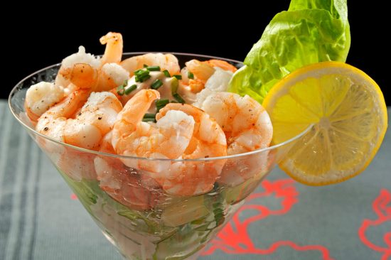 Shrimp Cocktail is a classic appetizer that combines chilled, cooked shrimp with a tangy, spicy cocktail sauce.