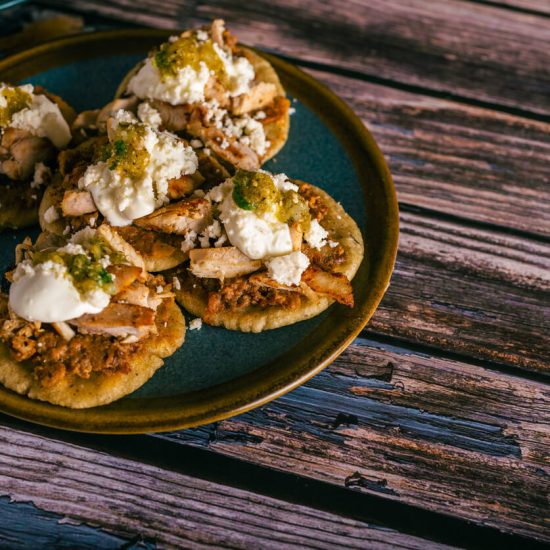 Sopes are a fun and customizable dish that can be enjoyed as an appetizer or a main course, and they are perfect for involving the whole family in the cooking process. The toppings can be mixed and matched according to personal preferences, making them a versatile choice for any meal.