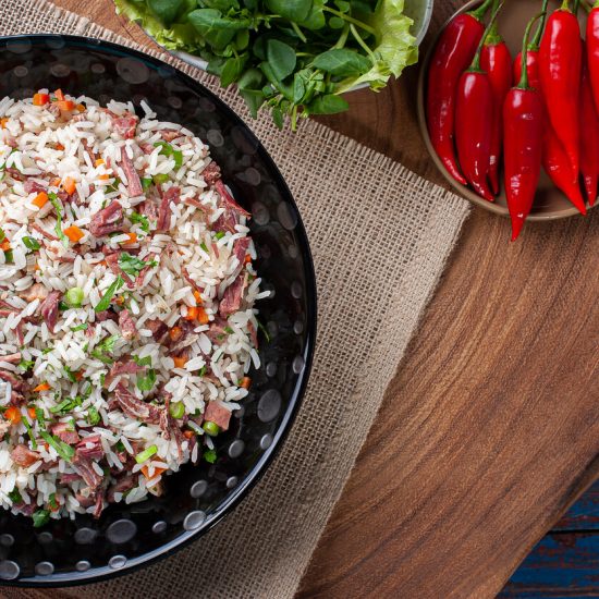 Arroz Carreteiro is a flavorful and efficient way to utilize leftover meats, transforming simple ingredients into a fulfilling meal that resonates with the gaucho spirit of Brazil. It's a practical, versatile dish that can be adapted to include whatever meats and vegetables you have on hand.